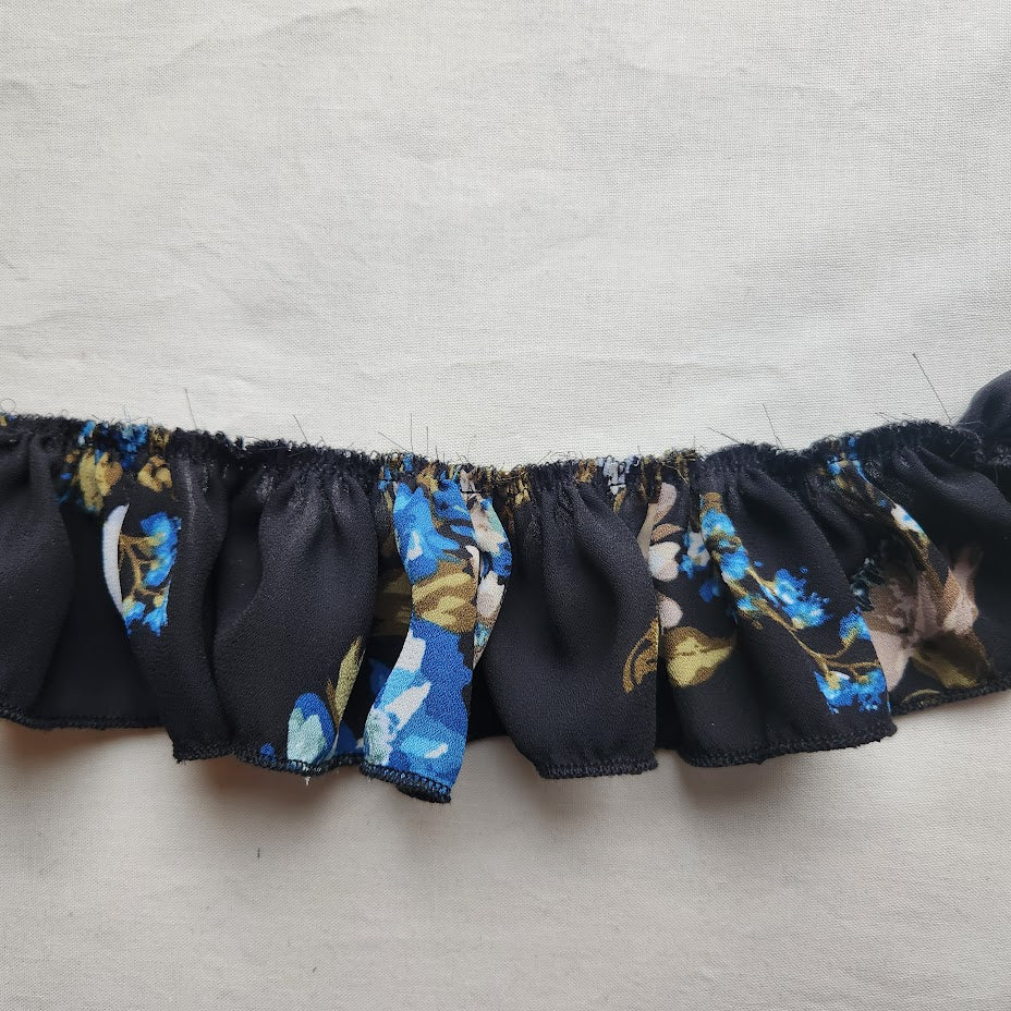 Black and Blue Flowered Ruffle Trim