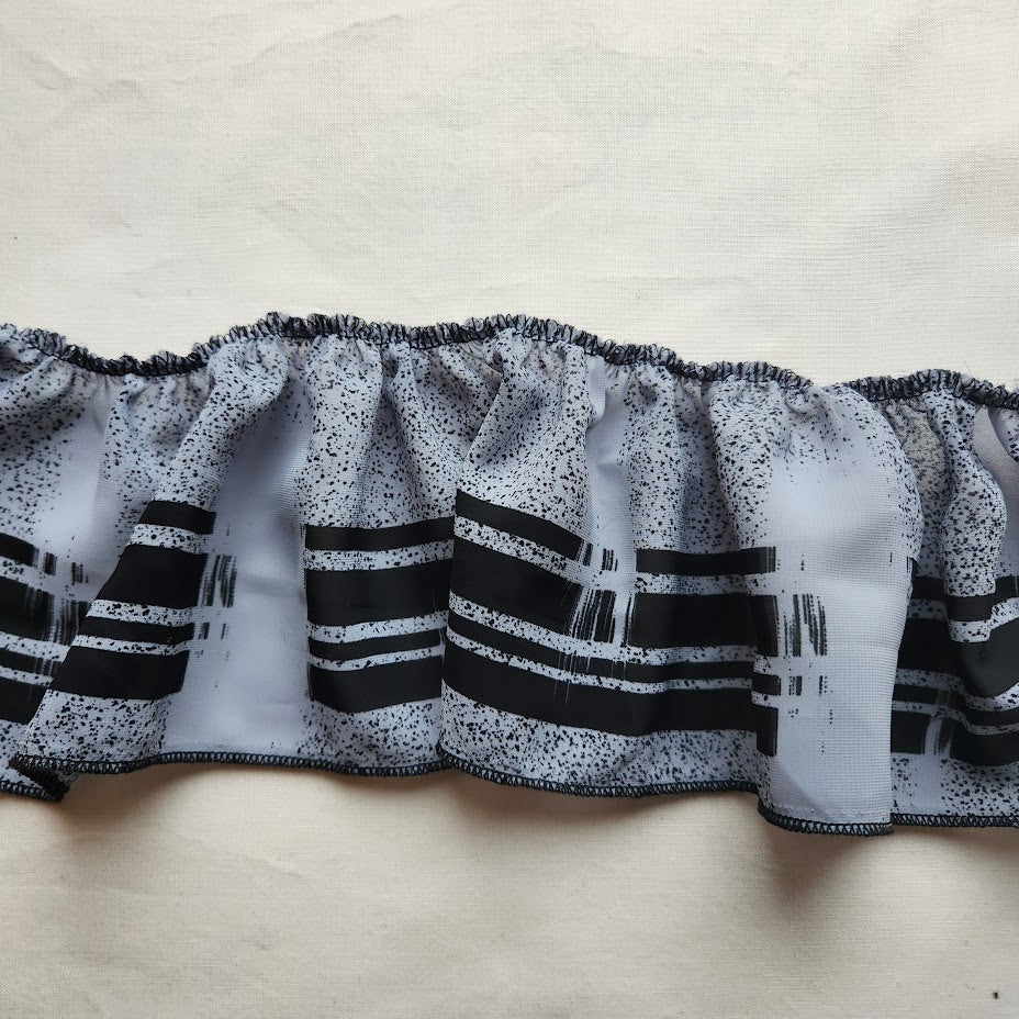 Grey and black striped Ruffle Trim